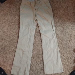 Tan jeans with boot cut bottom